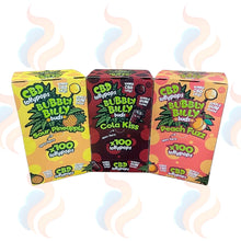 Three boxes of CBD Bubbly Billy lollypops with colourful packaging on a white background.