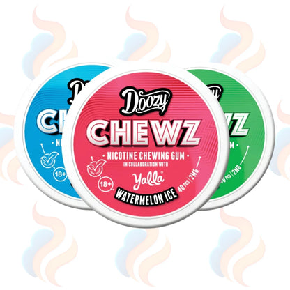Three containers of Doozy Chewz nicotine chewing gum in blue, pink, and green on a white background.