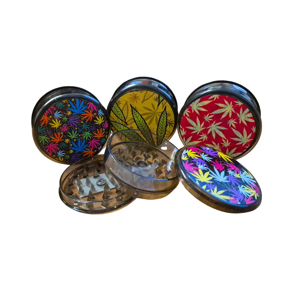 Fizz three-part herb grinder with colourful cannabis leaf patterns on a white background