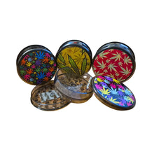 Fizz three-part herb grinder with colourful cannabis leaf patterns on a white background