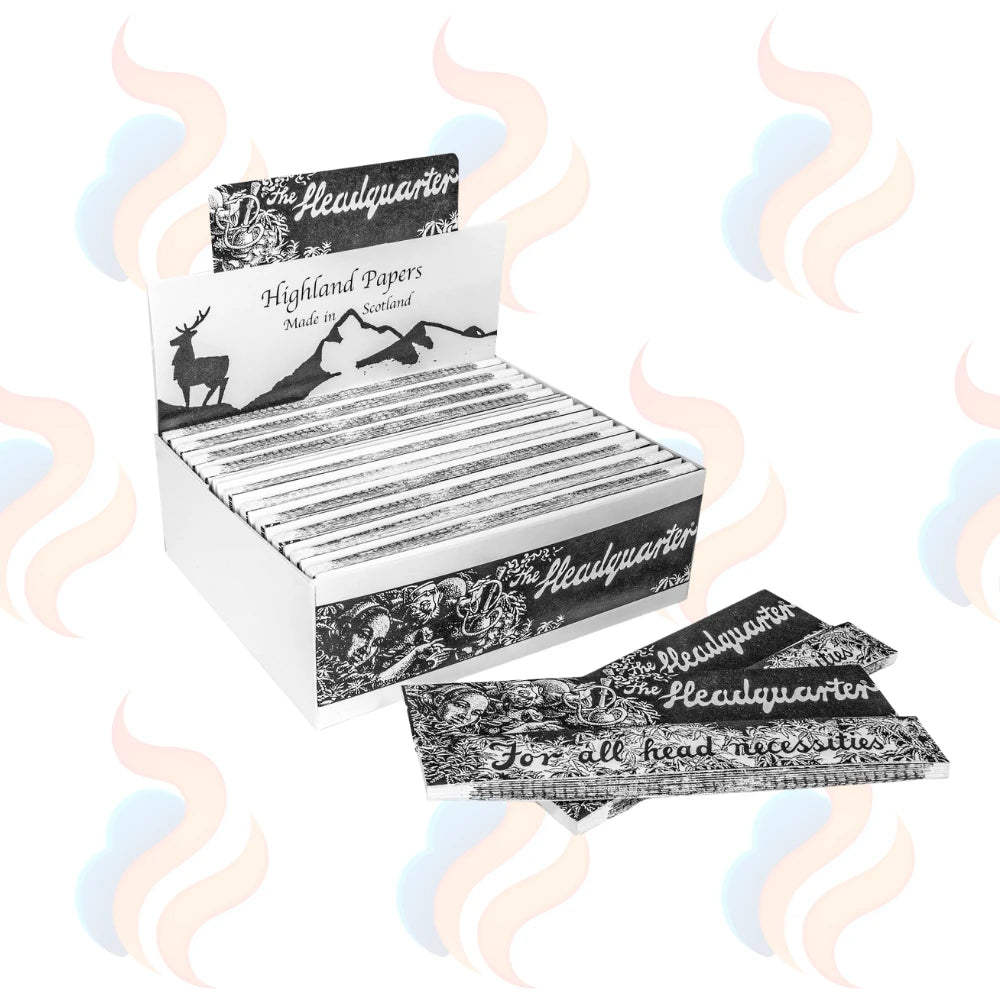 Black and white Highland "the Headquarter" rolling papers & tips on a white background
