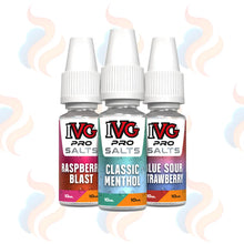 Three small IVG Pro Salts e-liquid bottles labeled Raspberry Blast, Classic Menthol, and Blue Sour Strawberry, arranged side by side on a white background with soft pastel smoke graphics.