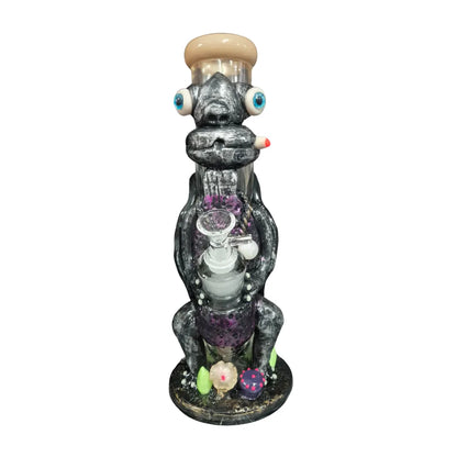 Black novelty glass waterpipe with an alien-inspired design on a white background