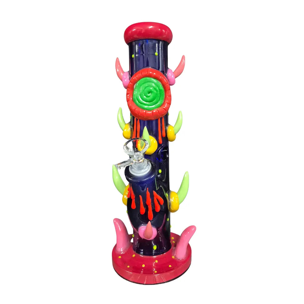 Colourful novelty glass waterpipe with an devil-inspired design on a white background