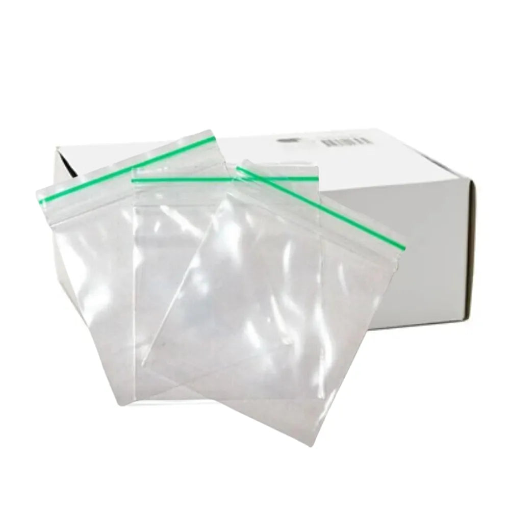 Clear "PUFF" plastic bags with green sealing strip and white box on a white background