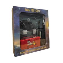 Packaged 'Rig in One' product with clear window showing contents on a white background