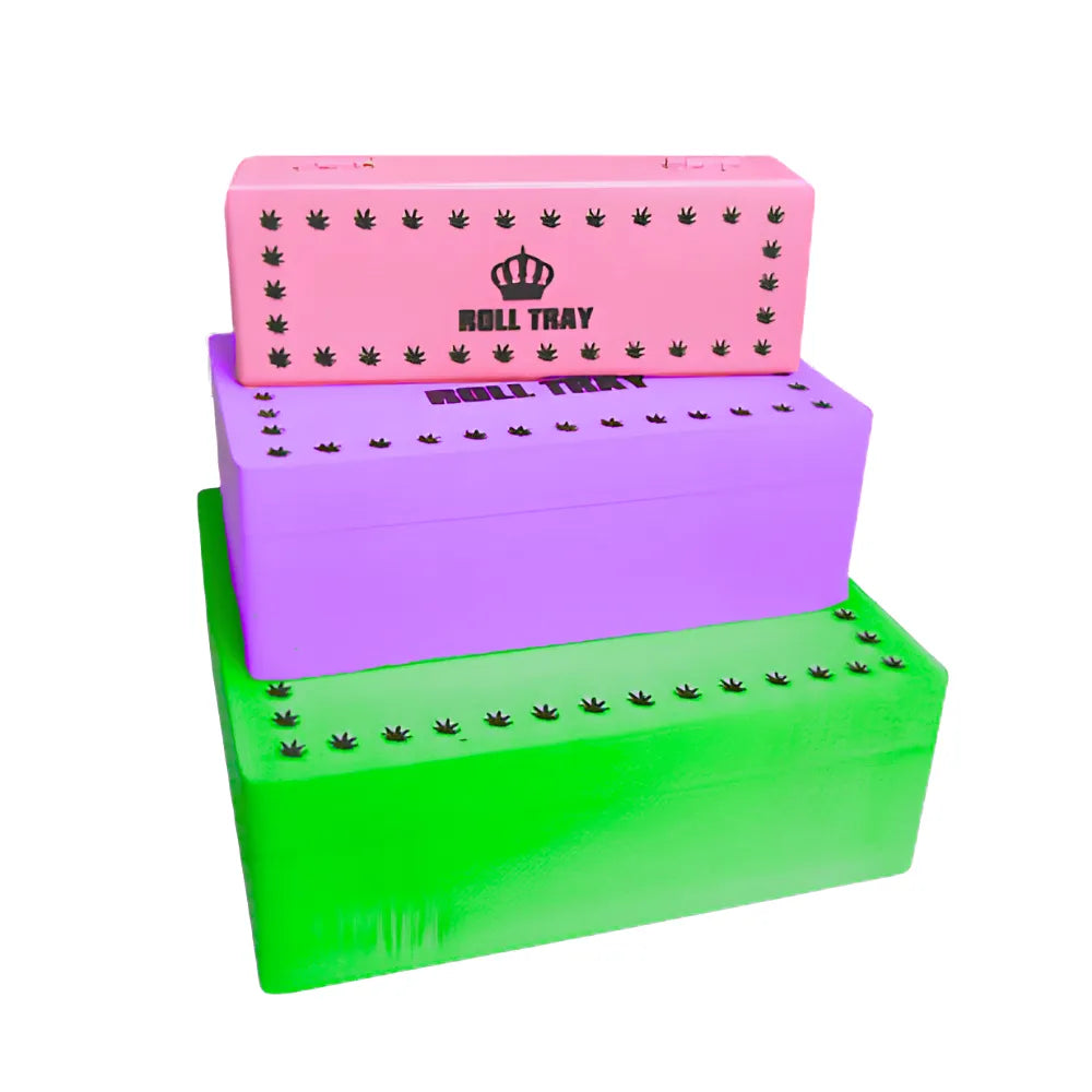 Three colourful "Roll Tray" wooden boxes stacked on a white background