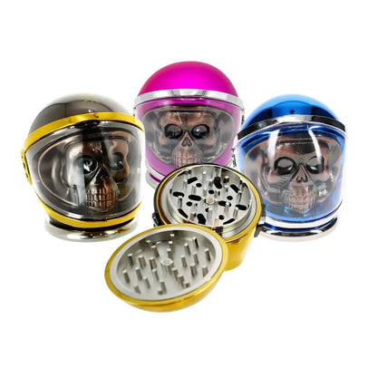 Three colourful skull helmet grinders on a white background