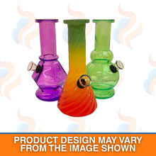 Three colourful shaped glass bongs on a white background
